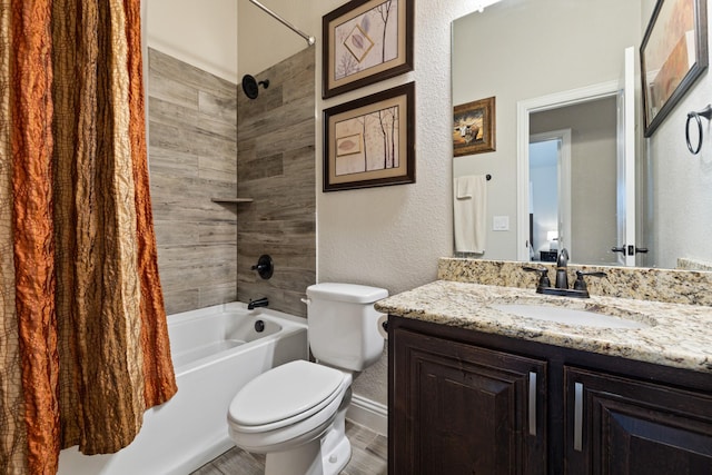 bathroom featuring toilet, shower / bath combo with shower curtain, vanity, and wood finished floors