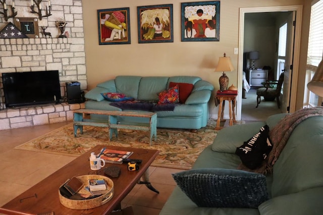 103 Apache Ct, Glen Rose, TX 76043 - tiled living room featuring a fireplace