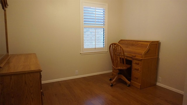 home office with wood finished floors and baseboards
