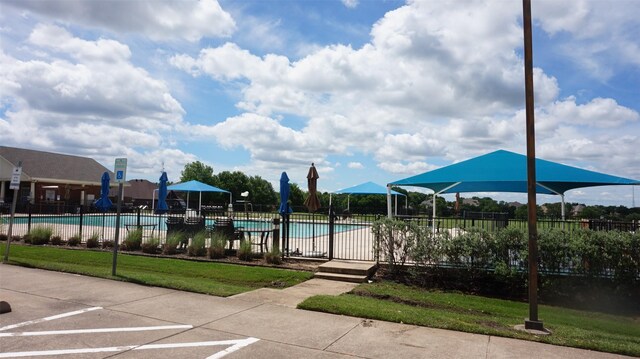 community pool with fence