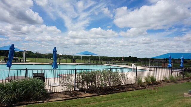 community pool with fence
