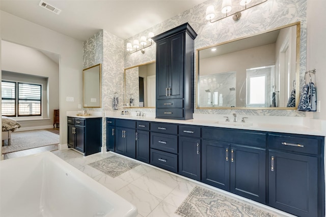 15102 Crape Myrtle Rd, Frisco, TX 75035 - bathroom featuring a soaking tub, double vanity, marble finish floors, and a shower
