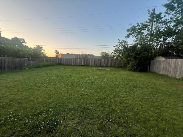 503 Cates Dr, Kaufman, TX 75142 - view of yard at dusk