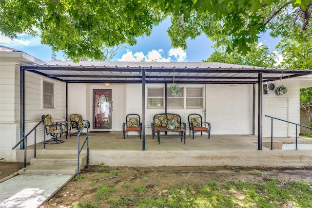 back of property featuring brick siding and covered porch