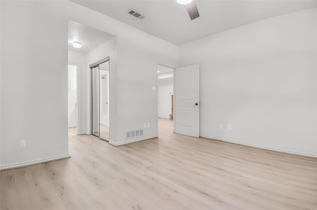 3022 Westforest Dr, Dallas, TX 75229 - unfurnished bedroom featuring wood finished floors, baseboards, and a ceiling fan