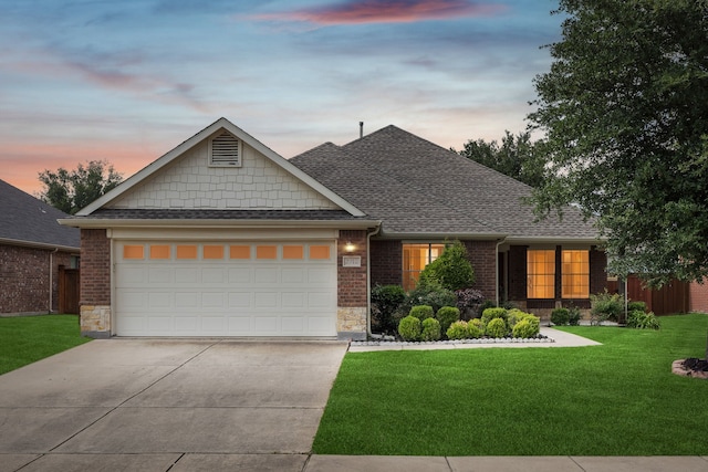 2912 Montalbo, Grand Prairie, TX 75054 - view of front of property with driveway, a front yard, an attached garage, brick siding, and roof with shingles