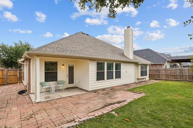 2912 Montalbo, Grand Prairie, TX 75054 - rear view of property featuring a patio, a chimney, and a shingled roof