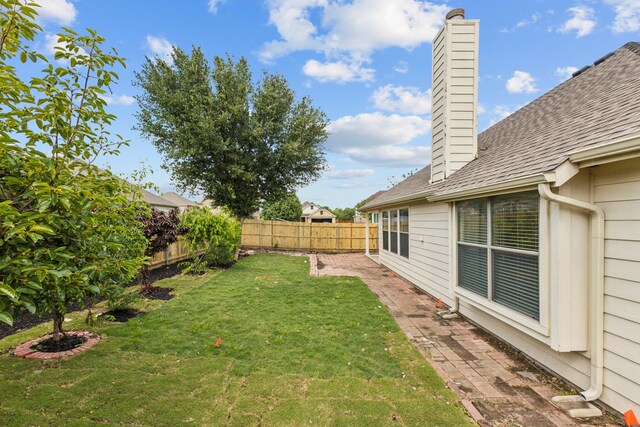 2912 Montalbo, Grand Prairie, TX 75054 - fenced backyard with a patio area