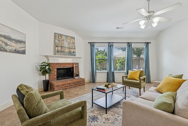 2912 Montalbo, Grand Prairie, TX 75054 - living room with lofted ceiling, a ceiling fan, baseboards, light tile patterned floors, and a fireplace