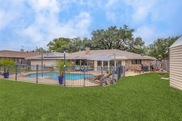 view of swimming pool with a patio
