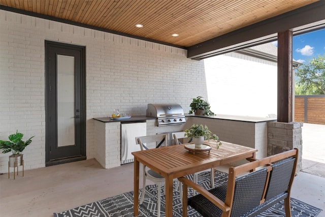 9001 Emma Ct, Granbury, TX 76049 - view of patio / terrace with an outdoor kitchen, grilling area, and outdoor dining area