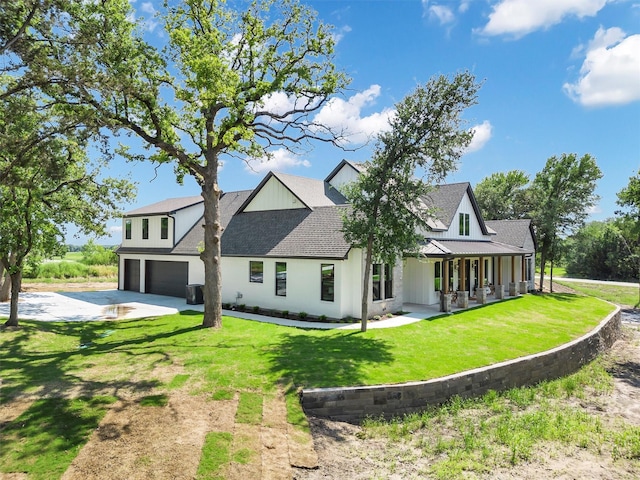 9001 Emma Ct, Granbury, TX 76049 - view of front of home with an attached garage, driveway, a front lawn, a porch, and a shingled roof
