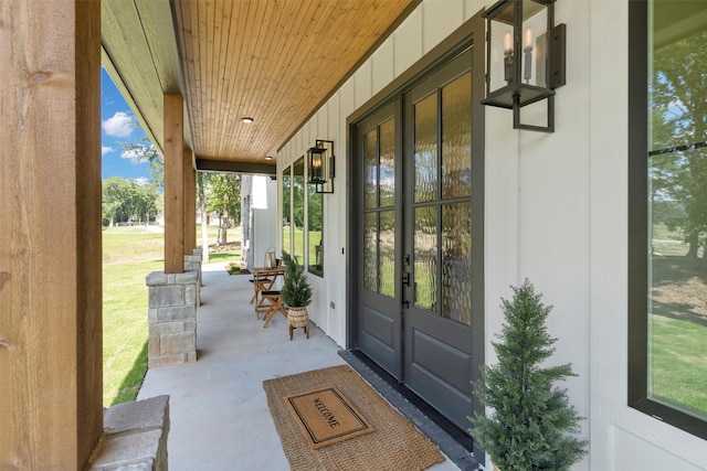9001 Emma Ct, Granbury, TX 76049 - view of exterior entry featuring a porch and french doors