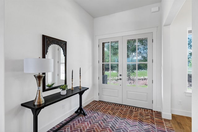 9001 Emma Ct, Granbury, TX 76049 - entryway featuring brick flooring, baseboards, and french doors