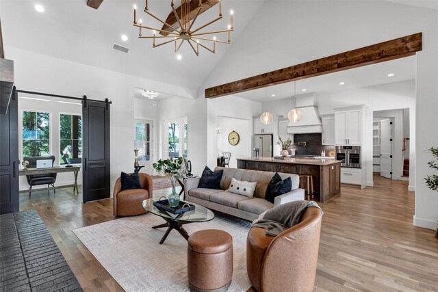 9001 Emma Ct, Granbury, TX 76049 - living area featuring high vaulted ceiling, a chandelier, plenty of natural light, an office area, and recessed lighting