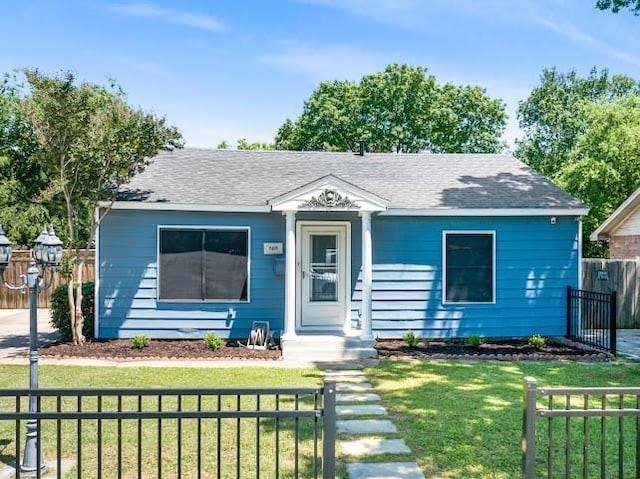 505 Worthway Dr, Grand Prairie, TX 75051 - bungalow-style house featuring roof with shingles and a gate