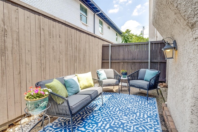 4229 Cole Ave Unit 115, Dallas, TX 75205 - view of patio featuring fence and outdoor lounge area