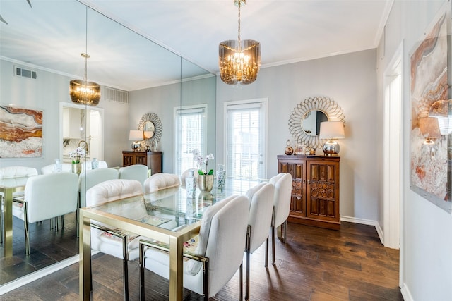 4229 Cole Ave Unit 115, Dallas, TX 75205 - dining area with a chandelier, ornamental molding, baseboards, and dark wood-style floors