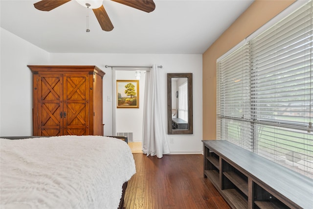 4325 Shady Glen Dr, Waco, TX 76708 - bedroom featuring dark wood-style flooring, baseboards, and ceiling fan