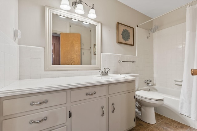 4325 Shady Glen Dr, Waco, TX 76708 - bathroom featuring tile walls, toilet, shower / tub combo with curtain, vanity, and tile patterned floors