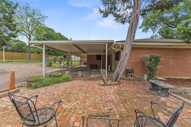 4325 Shady Glen Dr, Waco, TX 76708 - view of patio / terrace featuring fence and a carport