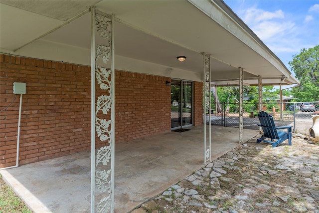 4325 Shady Glen Dr, Waco, TX 76708 - view of patio featuring fence and an attached carport
