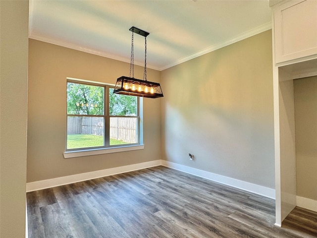 2004 Clay St, Mabank, TX 75147 - unfurnished dining area with crown molding, dark wood-style flooring, and baseboards