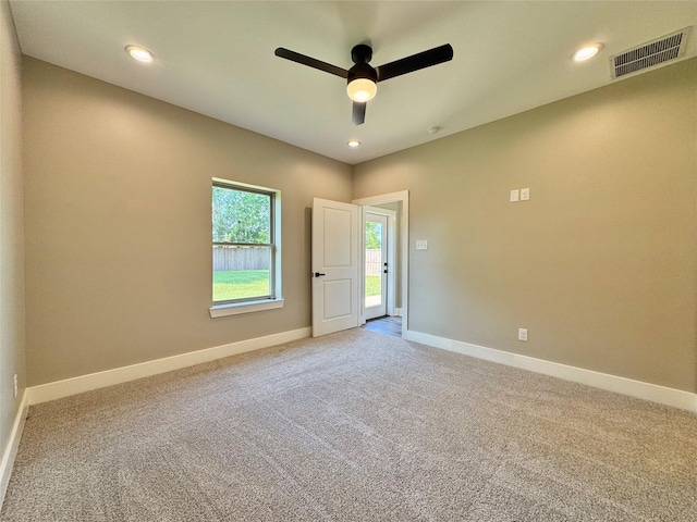 2004 Clay St, Mabank, TX 75147 - empty room with ceiling fan, light carpet, baseboards, and recessed lighting