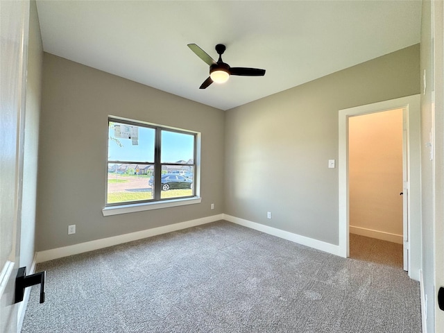 2004 Clay St, Mabank, TX 75147 - empty room with carpet flooring, baseboards, and a ceiling fan