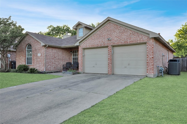 view of front of property with brick siding, a garage, central air condition unit, driveway, and a front lawn