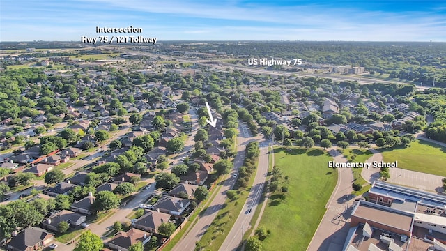 view of property location featuring nearby suburban area