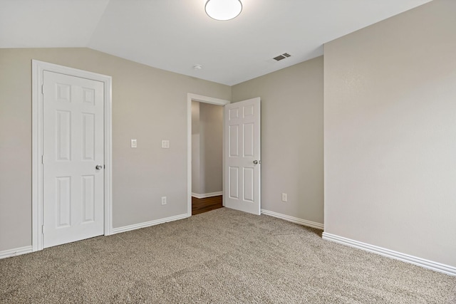 15159 County Road 549, Nevada, TX 75173 - unfurnished bedroom featuring carpet flooring, baseboards, and vaulted ceiling