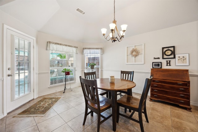 1608 Fallingwater Trl, Fort Worth, TX 76052 - dining space with vaulted ceiling, light tile patterned flooring, a chandelier, and baseboards