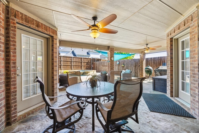 1608 Fallingwater Trl, Fort Worth, TX 76052 - view of patio with a fenced backyard, ceiling fan, and outdoor dining area