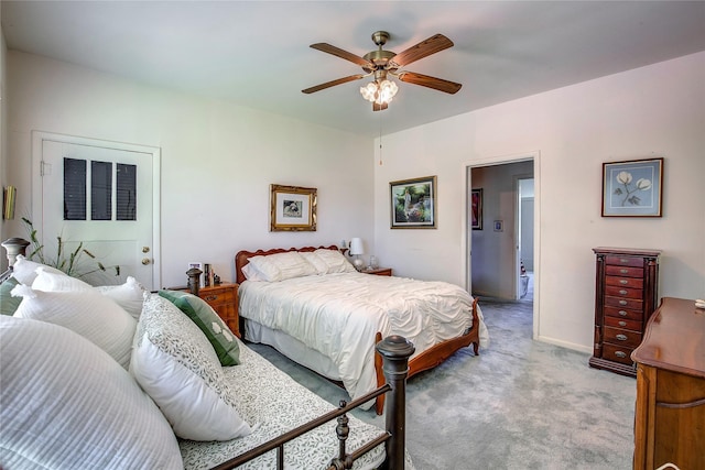 1005 Church St, Sulphur Springs, TX 75482 - bedroom featuring light carpet, a ceiling fan, baseboards, and ensuite bath