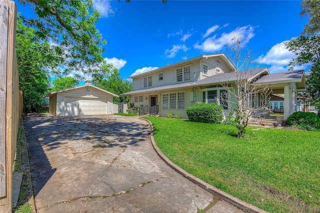 1005 Church St, Sulphur Springs, TX 75482 - view of front of home featuring a garage, an outdoor structure, and a front lawn