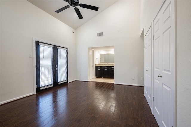 6808 Eastridge Dr Unit A7, Dallas, TX 75231 - unfurnished living room featuring dark wood-style floors, a ceiling fan, high vaulted ceiling, baseboards, and french doors