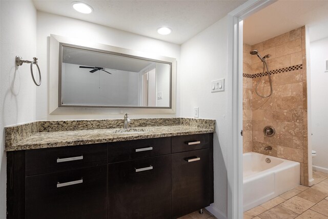 6808 Eastridge Dr Unit A7, Dallas, TX 75231 - bathroom featuring vanity, toilet, bathing tub / shower combination, tile patterned floors, and baseboards