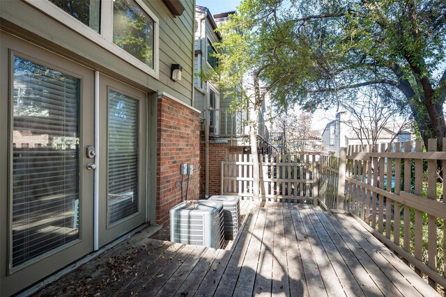 6808 Eastridge Dr Unit A7, Dallas, TX 75231 - wooden deck featuring cooling unit and fence