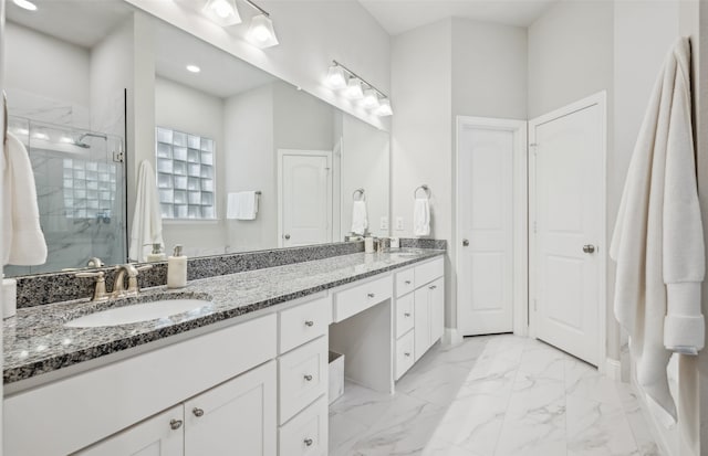 719 Hammond St, Coppell, TX 75019 - bathroom with a stall shower, double vanity, marble finish flooring, and recessed lighting