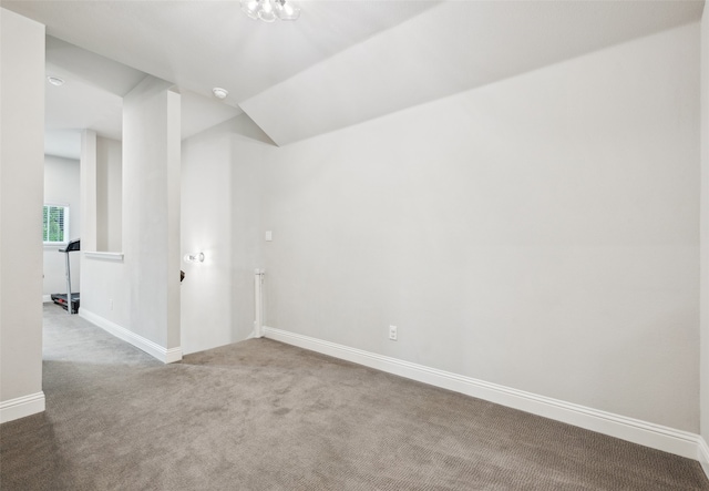719 Hammond St, Coppell, TX 75019 - empty room with carpet, baseboards, lofted ceiling, and a smoke detector