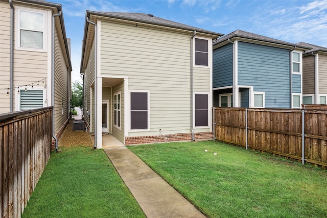 719 Hammond St, Coppell, TX 75019 - rear view of property featuring central AC unit