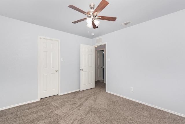 2217 Heaton St, Forney, TX 75126 - unfurnished bedroom with carpet, baseboards, and a ceiling fan