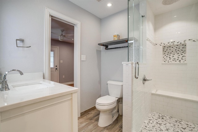 7000 County Road 527, Burleson, TX 76028 - full bath featuring ceiling fan, a shower stall, wood finished floors, and toilet
