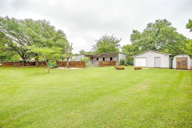 7000 County Road 527, Burleson, TX 76028 - view of yard with an outbuilding, a garage, a storage unit, an exterior structure, and fence