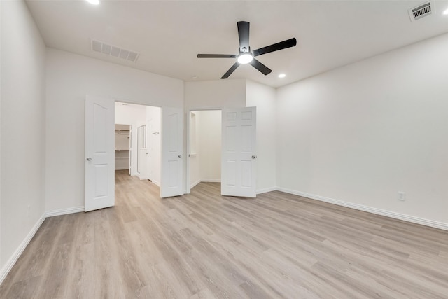 10832 Hawks Landing Rd, Fort Worth, TX 76052 - unfurnished bedroom with light wood-type flooring, a spacious closet, recessed lighting, baseboards, and a ceiling fan