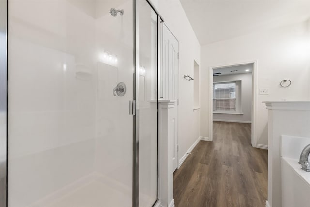 10832 Hawks Landing Rd, Fort Worth, TX 76052 - bathroom with a shower stall, wood finished floors, and baseboards