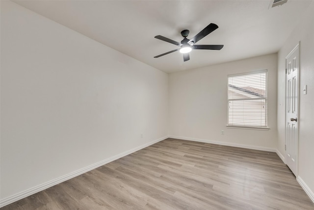 10832 Hawks Landing Rd, Fort Worth, TX 76052 - unfurnished room featuring light wood-type flooring, ceiling fan, and baseboards