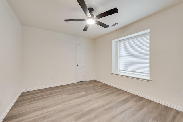 10832 Hawks Landing Rd, Fort Worth, TX 76052 - spare room featuring light wood-style flooring, ceiling fan, and baseboards