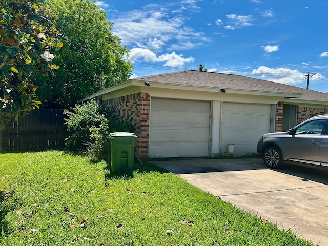view of side of property featuring brick siding, fence, driveway, and roof with shingles